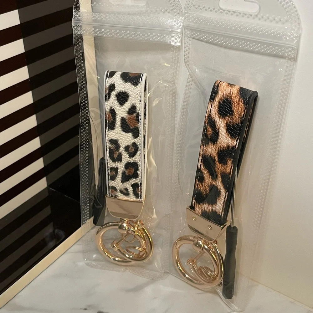 Leopard Print Keychain with Gold Accents - White